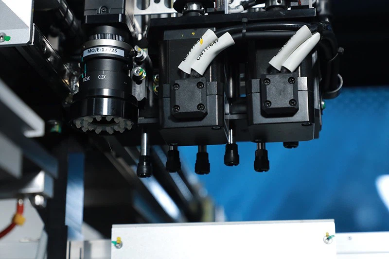 Dual-Arm, Dual-Rail Multi-Station Pick-and-Place Machine